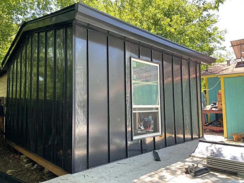 Black standing seam metal wall panels for Metal Roof Installation in Venice