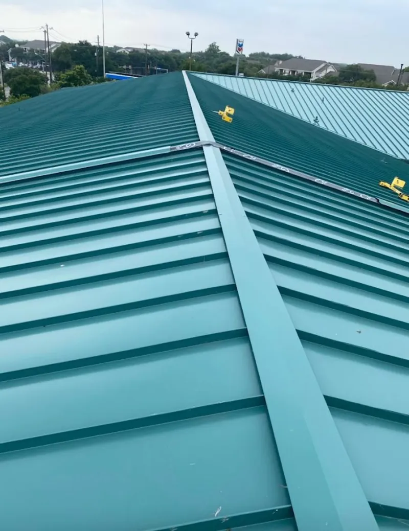 Green commercial metal roof ridge and valley for Metal Roof Repair in Venice